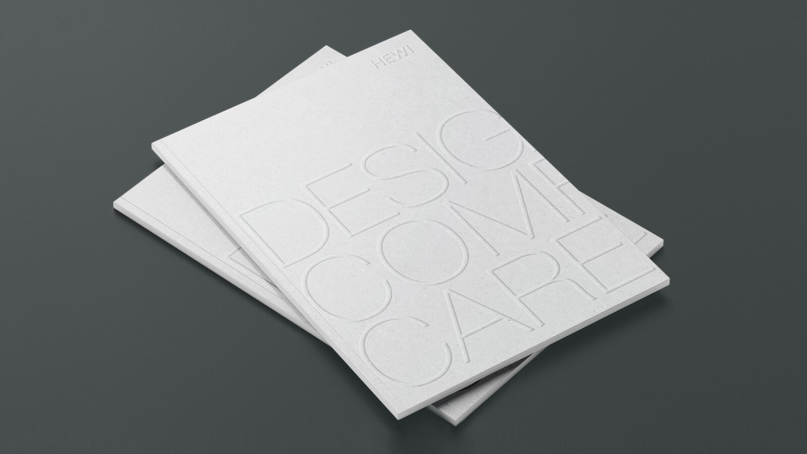 Ontwerp Comfort Care Twee gestapelde brochures met de naam Design Comfort Care